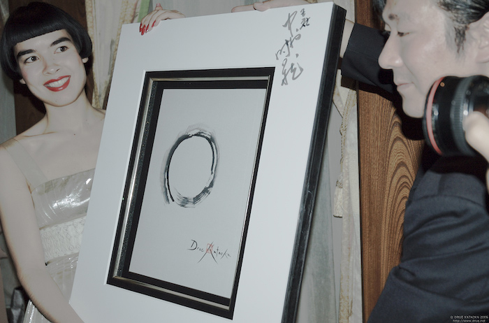 Ito san and Drue hold Enso 2008 for Press